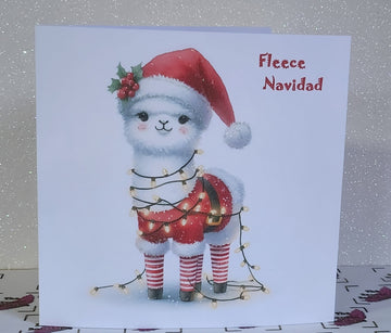Feliz Navidad Llama Christmas Card ' Fleece Navidad' Llama In Santa Hat And Christmas Lights Glitter Detailing Linen Effect Free Delivery