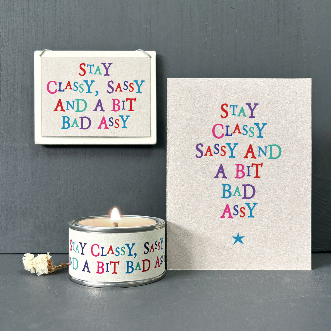 Scented Candle In Tin 'Stay Classy, Sassy & A Bit Bad Assy' Sweet Orange Fragrance East Of India Wonky Word Candle