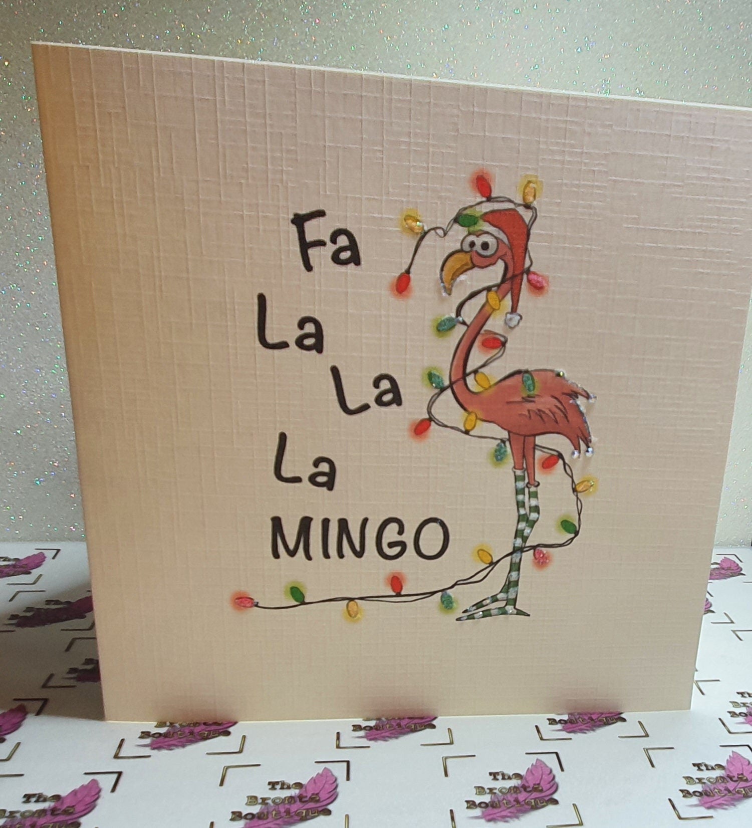 Flamingo Christmas Card ' Fa La La Mingo'  Flamingo In Santa Hat And Christmas Lights Swarovski Crystal Detailing Linen Effect Free Delivery