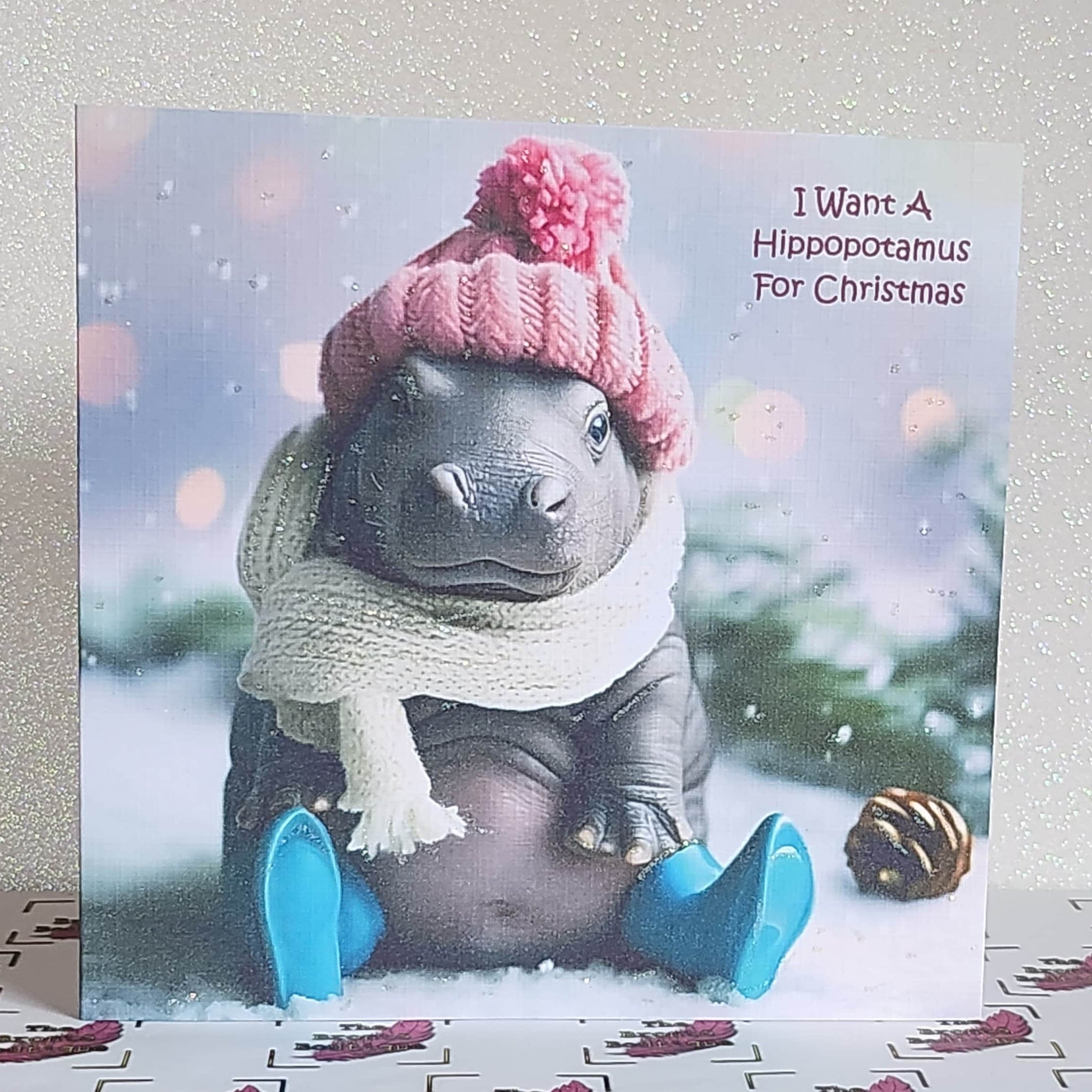 Hippo Christmas Card ' I Want A Hippopotamus' for Christmas Baby Hippo Wearing Pink Bobble Hat And Blue Wellies With Glitter Free Delivery