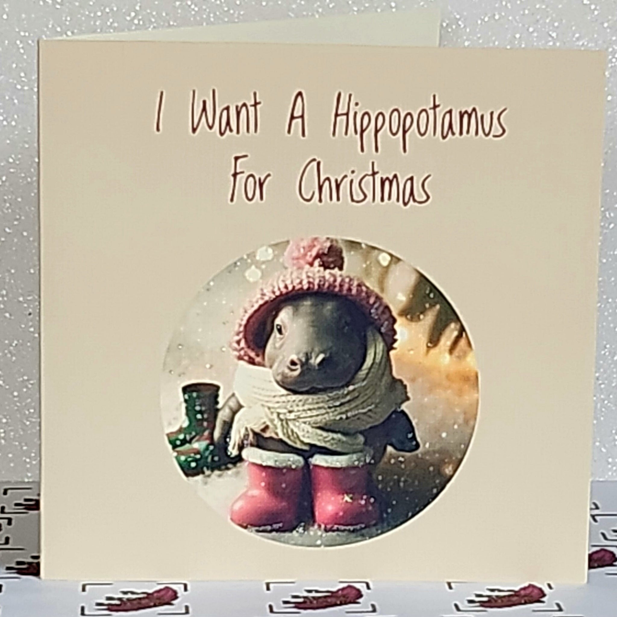 Hippo Christmas Card ' I Want A Hippopotamus for Christmas' Baby Hippo Wearing Bobble Hat And Pink Wellies With Glitter White Free Delivery