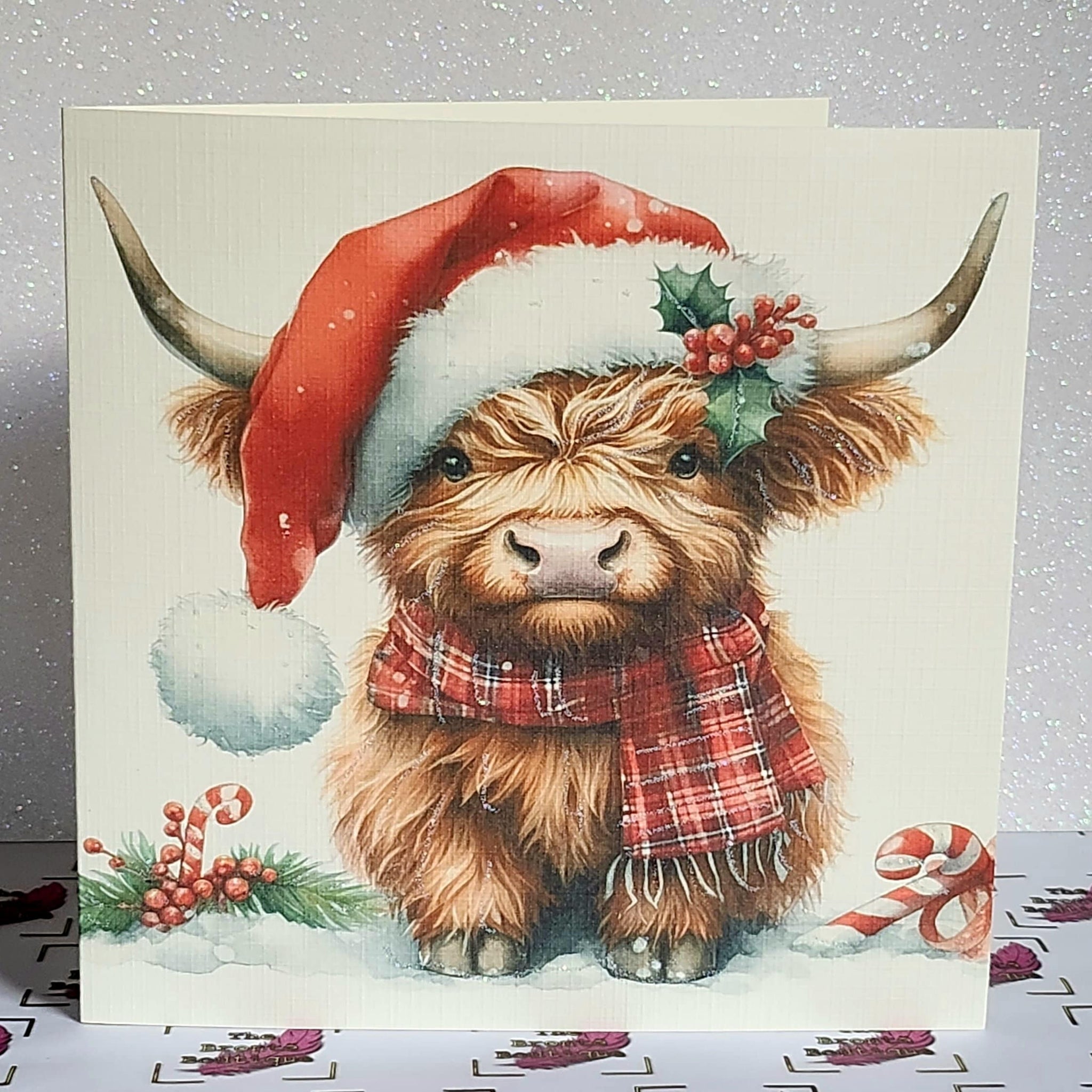 Highland Cow Christmas Card Highland Coo With Santa Hat Scarf And Holly Handmade Glitter Ivory Linen Effect Square Card Free Delivery