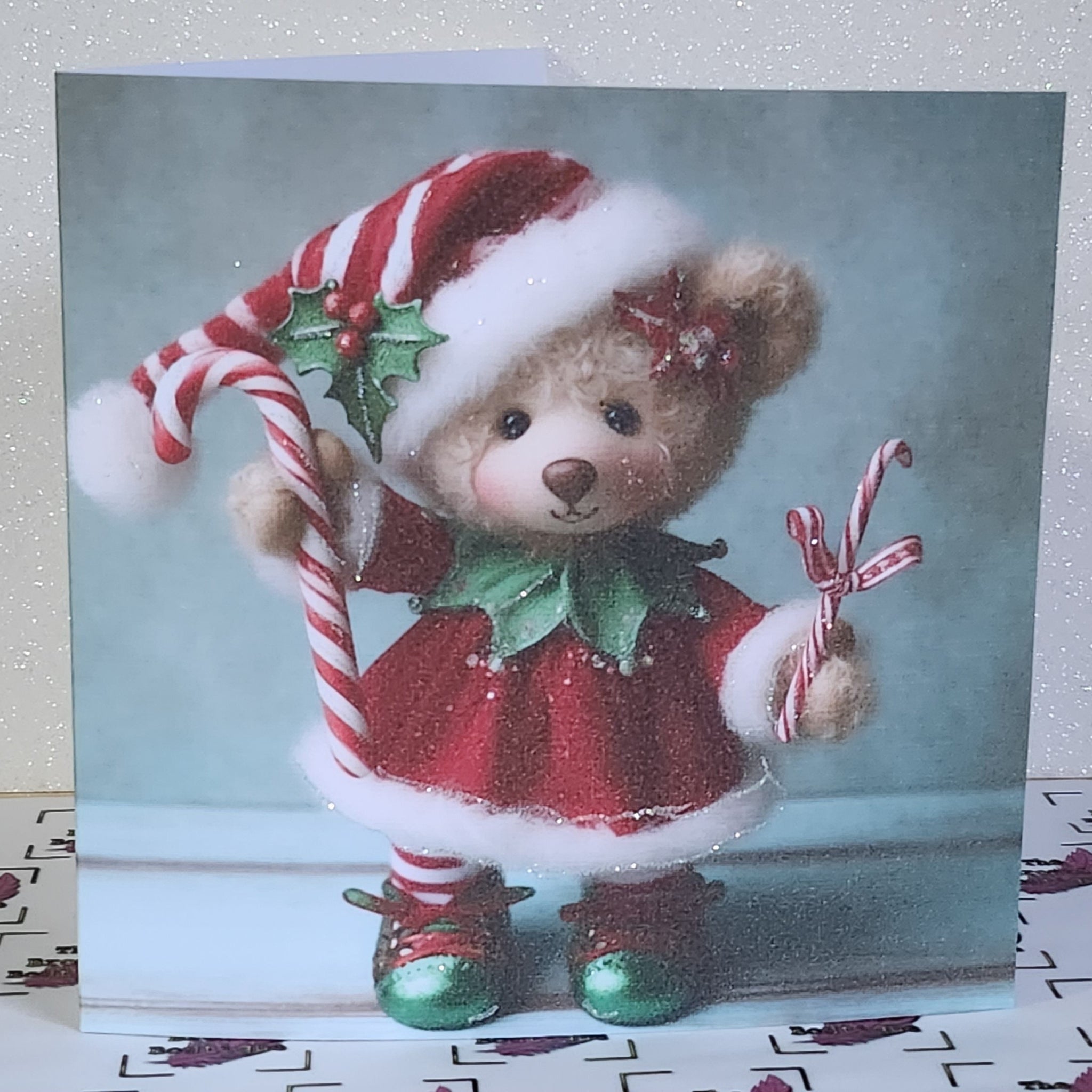 Christmas Elf Card Handmade Tatty Teddy Bear Elf With Candy Cane Elf Outfit Glitter Detail Shiny Shoes Linen Effect White Card Free Delivery