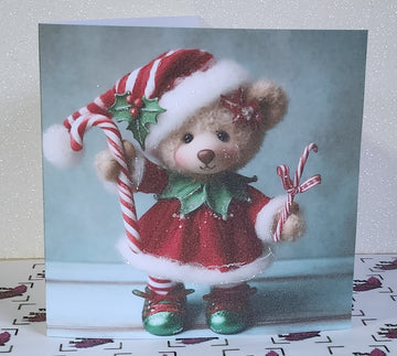 Christmas Elf Card Handmade Tatty Teddy Bear Elf With Candy Cane Elf Outfit Glitter Detail Shiny Shoes Linen Effect White Card Free Delivery