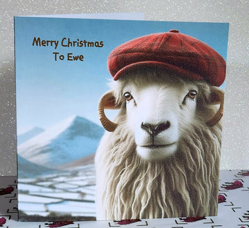 Christmas Sheep Card Handmade 'Merry Christmas To Ewe' Red Flat Cap In The Snow White Linen Effect Square Card Free Delivery