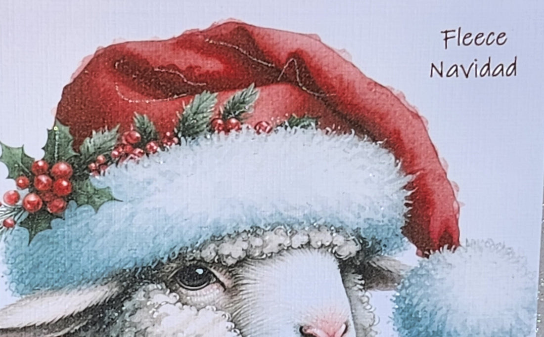 Feliz Navidad Sheep Christmas Card ' Fleece Navidad' Sheep In Santa Hat With Holly And Scarf Glitter Detailing Linen Effect Free Delivery