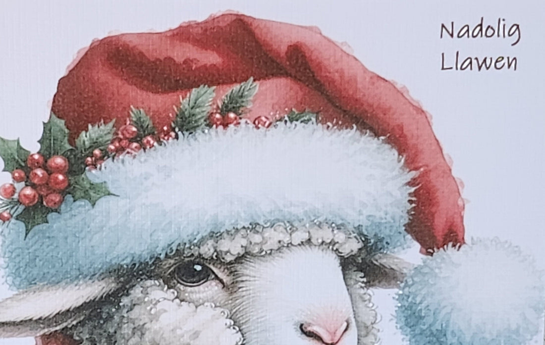 Nadolig Llawen Sheep Christmas Card Welsh Language Merry Christmas Sheep In Santa Hat With Holly And Scarf Linen Effect Free Delivery