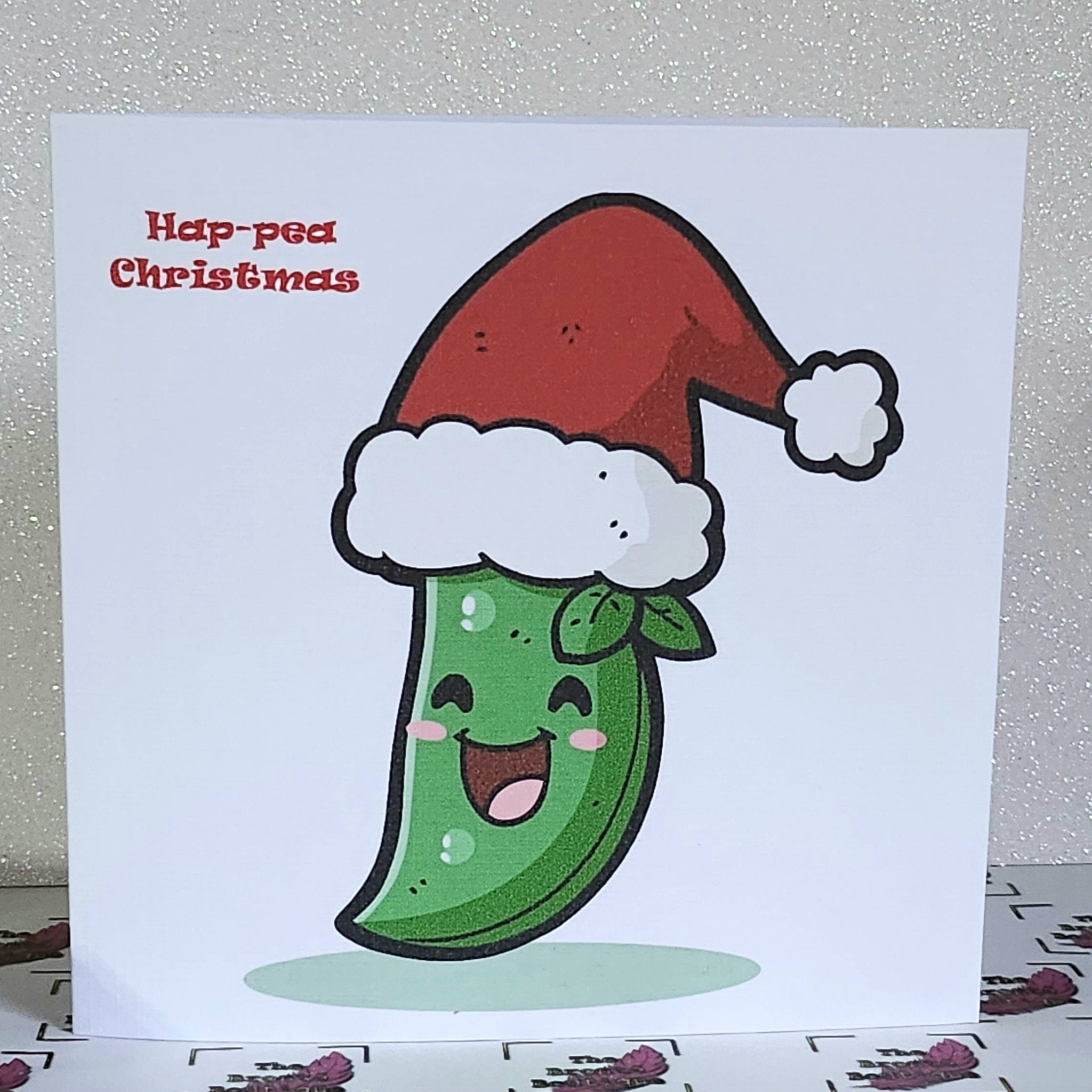 Funny Christmas Card 'Hap-pea Christmas' Laughing Cartoon Pea Pod In Santa Hat White Linen Effect Happy Christmas Festive Free Delivery