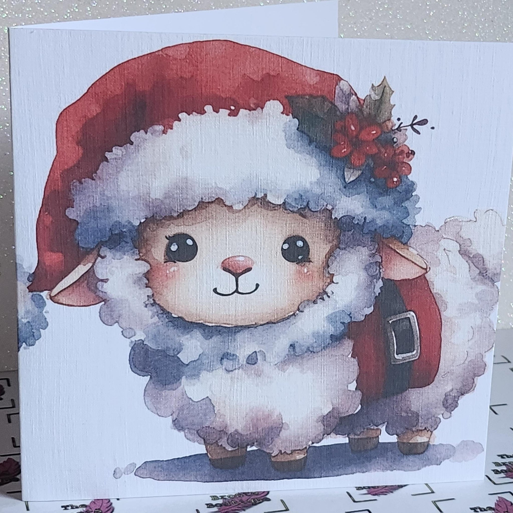 Santa Sheep Christmas Card Cute Sheep Wearing Santa Outfit Woolly Sheep With Holly Daughter  White Linen Effect Square Card Free Delivery