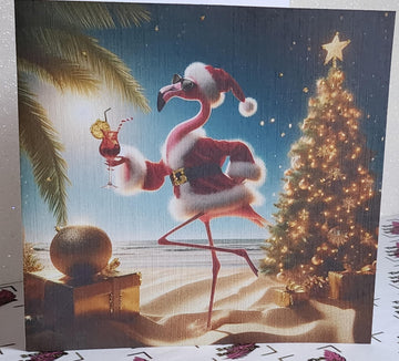 Flamingo Christmas Card 'Have A Flamazing Christmas' Flamingo Wearing Santa Outfit On Beach Gold Glitter Detail Linen Effect Free Delivery